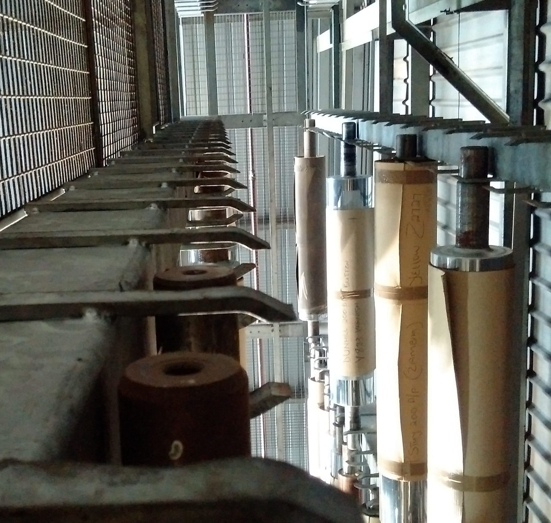 racking stands for print rollers used by a automation machine